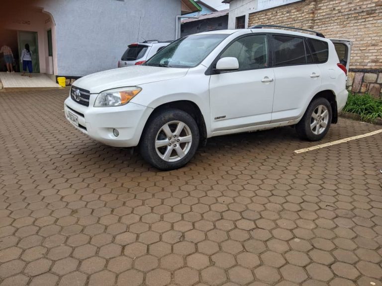 A silver premium Toyota RAV4 4x4 rental car available for self-drive safaris in Rwanda by Kigali Car Rent