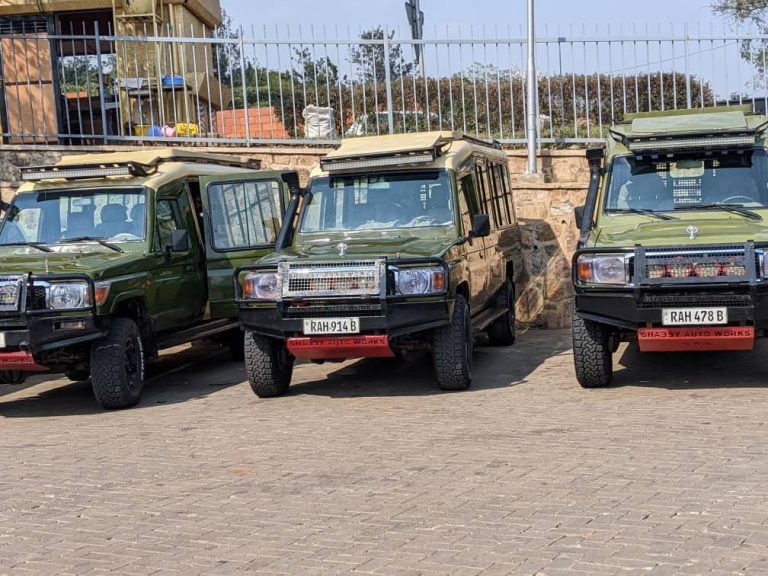 A black Toyota Land Cruiser Prado 4x4 safari rental car prepared for self-drive tours and gorilla trekking transport in Rwanda by Kigali Car Rent