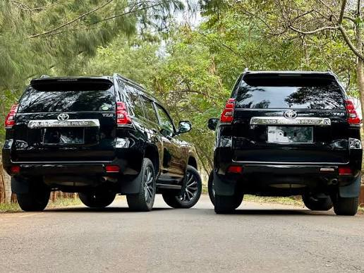 Self-drive rental SUV travelling on a scenic road in Rwanda